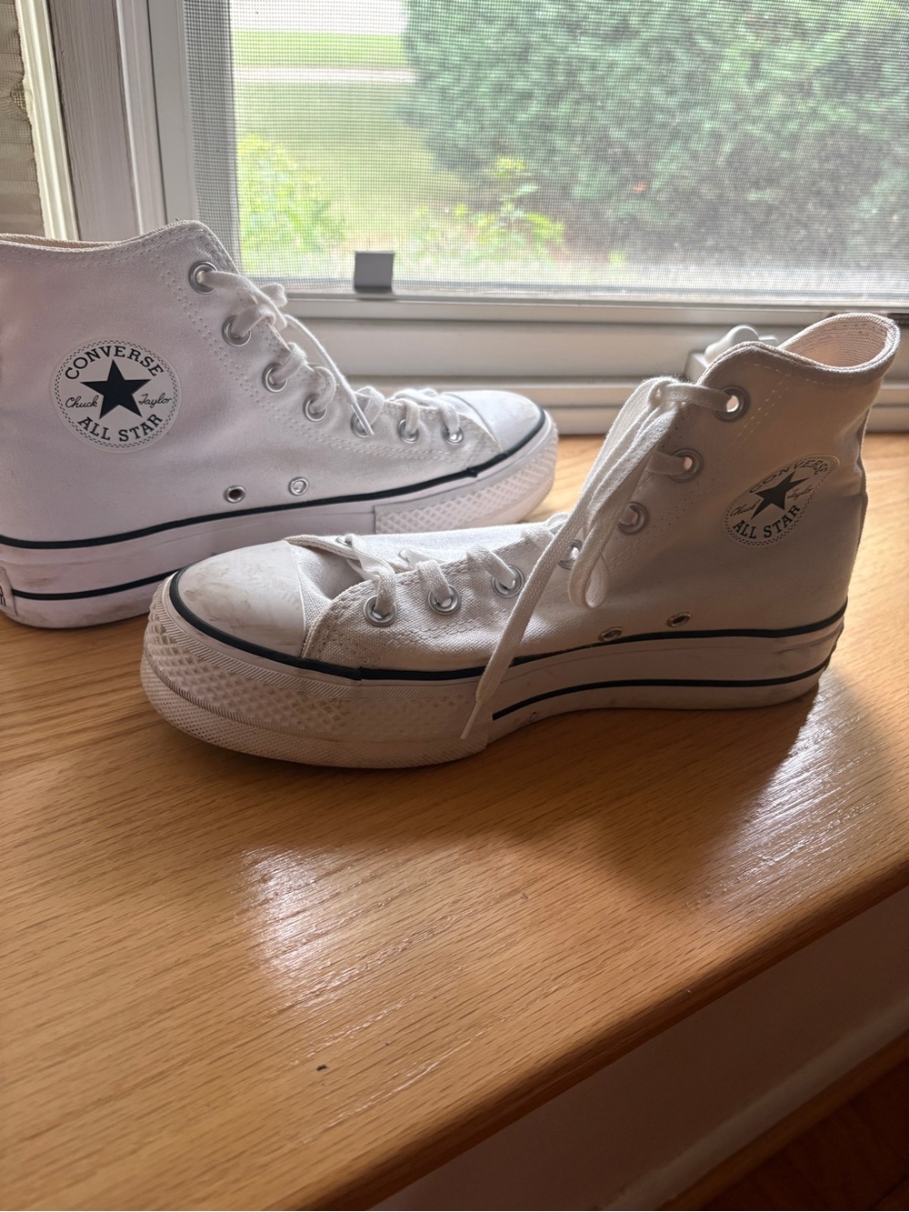 Converse Women's White High-Top Sneakers with Black Trim